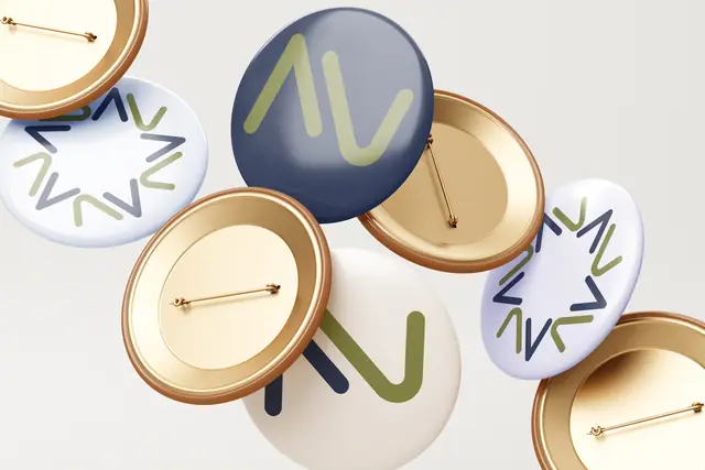 Novus Attractions rebranding & brand book, Brand applications, pin badge